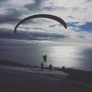 tandem paragliding flight shot