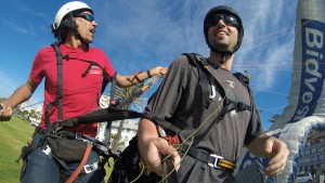 Tandem paragliding landing in Sea Point