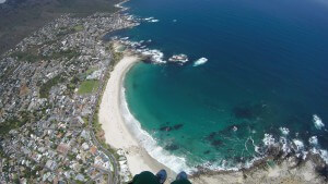 Camps Bay from the sky while tandem paragliding