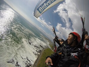 tandem paragliding turn above the Sea Point promenade